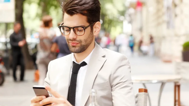 Employer running payroll on his cell phone.