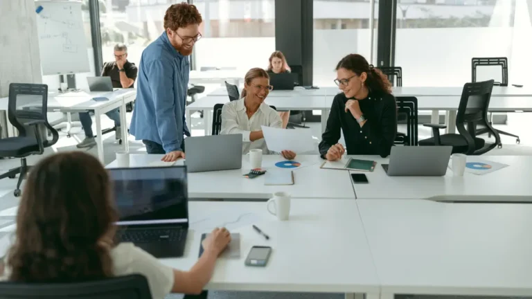 Employees working in a busy workplace.