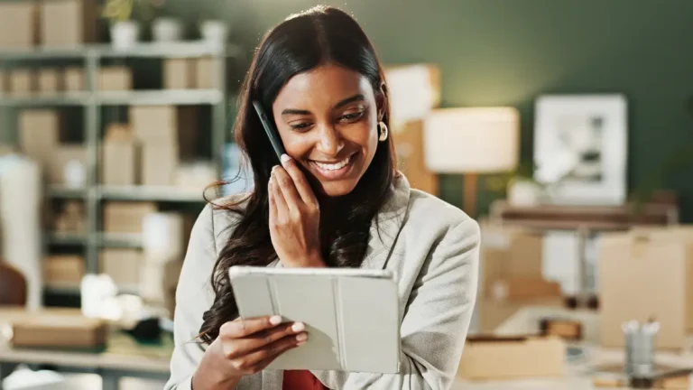 Employer running payroll for one employee on tablet.