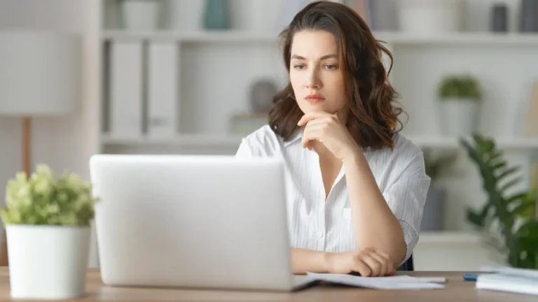 Employer learning about payroll software vs. payroll services.