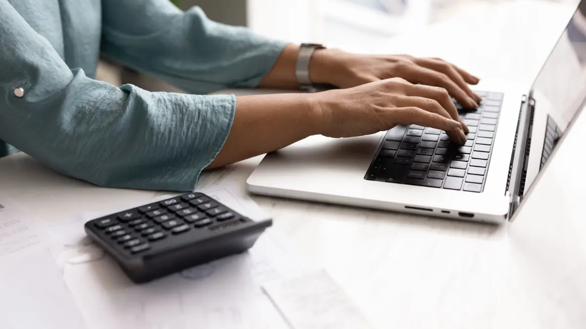 Employer using a spreadsheet to run payroll.